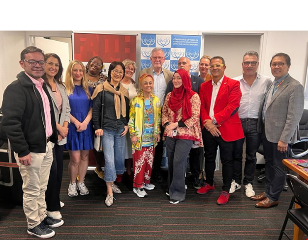 Bild på flera människor under ett FN-event.